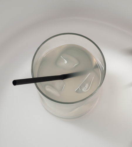 Top view of a 6-inch Black Cocktail hemp straw in a short glass of water